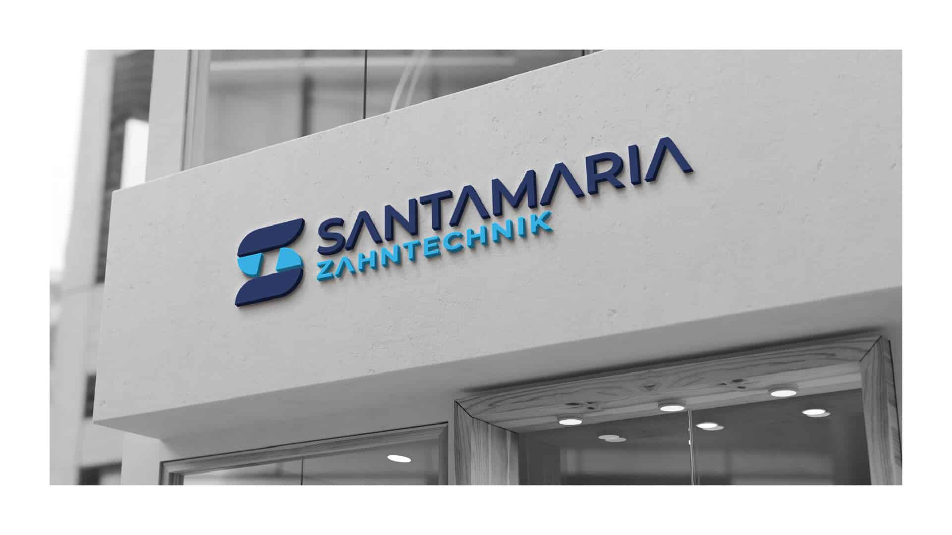 Logo von Santamaria Zahntechnik an einer Hausfassade